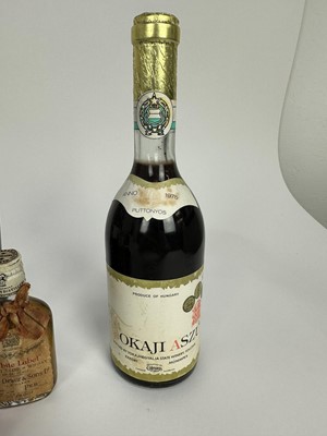 Lot 42 - Mixed group, to include Cockburns 2006 (2), Taylors 1999, Tokaji Aszu 4 Puttonyos, together with nine miniatures to include John Haig, Dewar White Label and others (13)