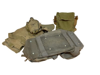 Lot 796 - Second World War American Army canvas webbing covered water bottle, belt, pouches and other webbing items including a gas mask in case (1 box).