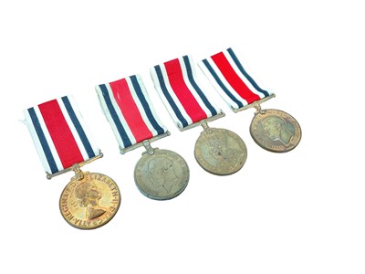 Lot 797 - Group of four Special Constabulary Long Service medals comprising George V named to Bernard. G. Preston. and Fred Bayfield, George VI named to Edward. G. Parker and Elizabeth II named to Sydney. C....