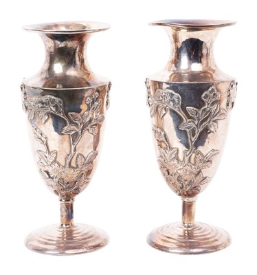 Lot 201 - Pair of late 19th/early 20th century Chinese silver vases