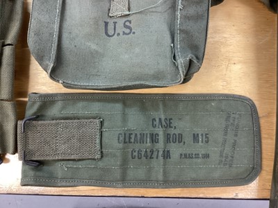 Lot 801 - Collection of Second World War and later American canvas webbing pouches, ammunition tin and other related militaria.