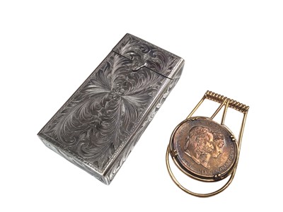 Lot 169 - White metal box possibly for cigarettes, together with a money clip set with a coin (2)