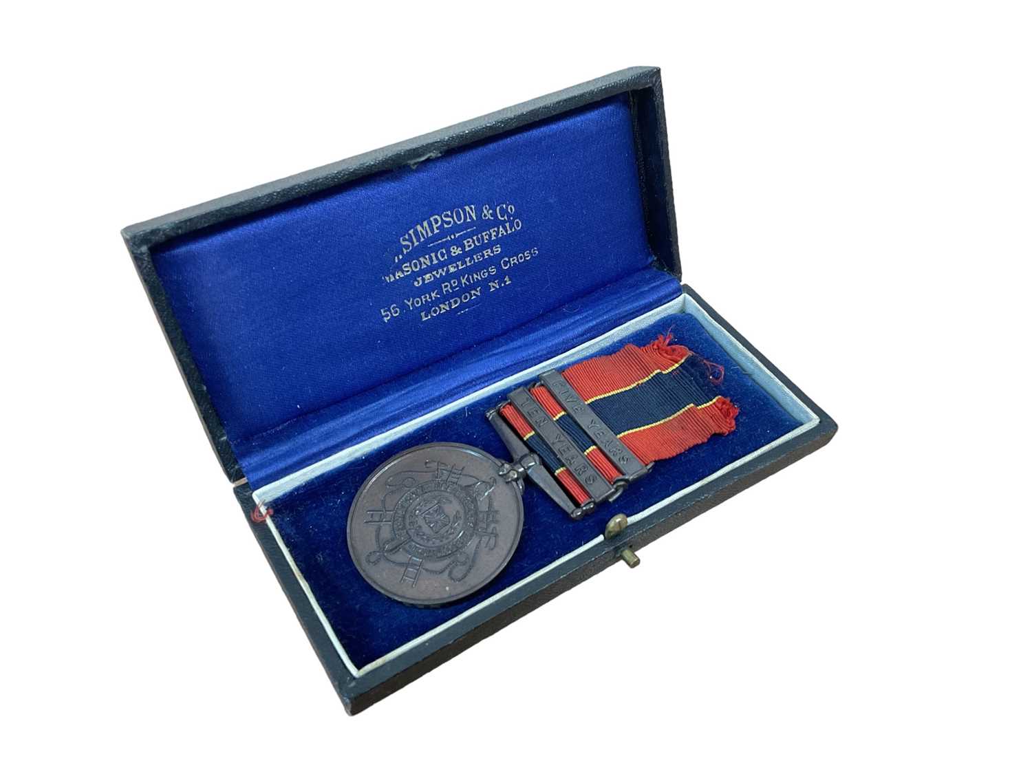 Lot 807 - National Fire Brigades Association Long Service medal with 5 years and 10 years clasps, named to 11588 Edward J. Moyser, in box, together with printed research including receiving the King's Commen...