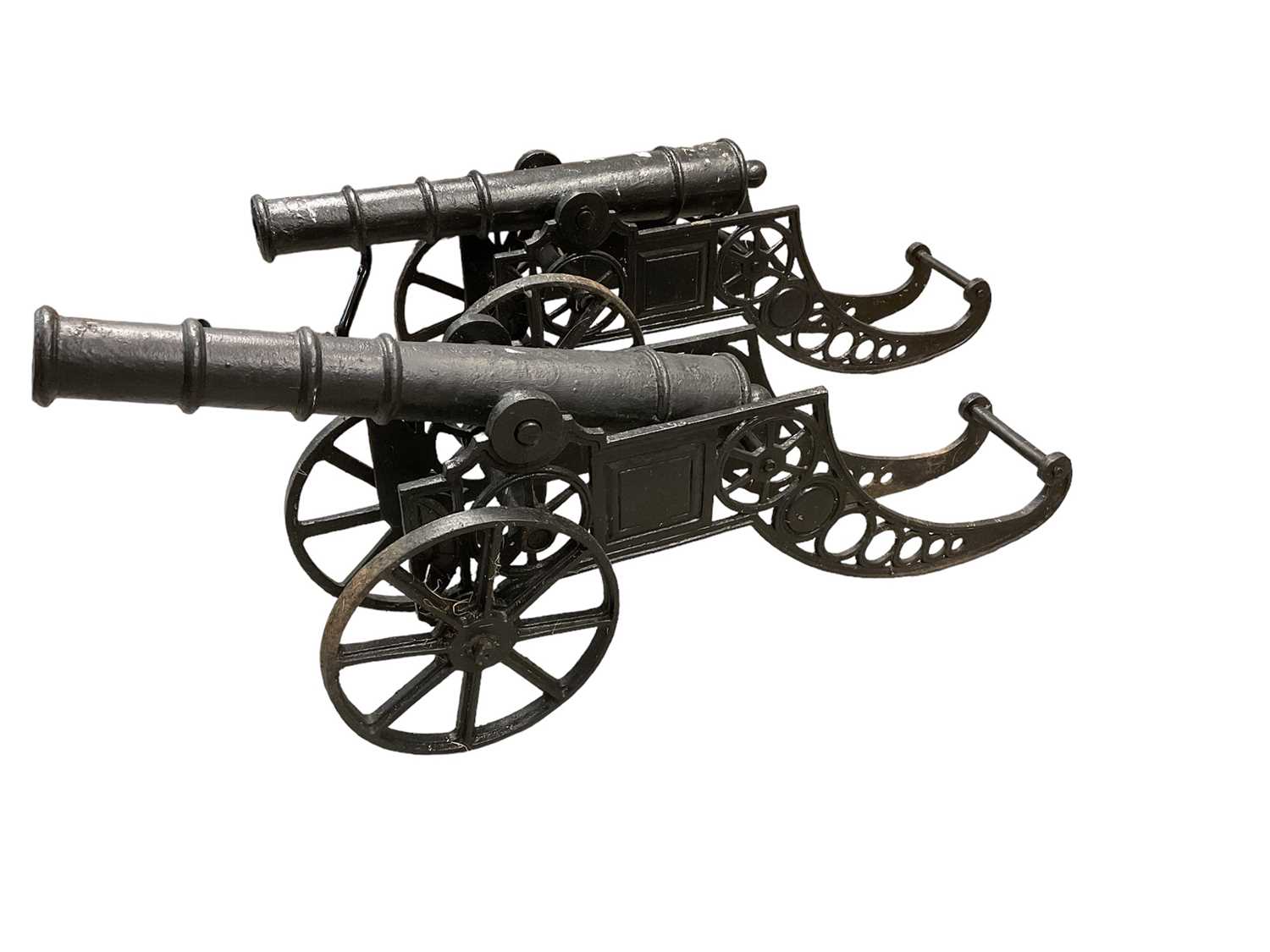 Lot 981 Pair of decorative cast iron cannons