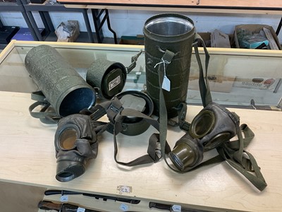 Lot 846 - Second World War British despatch riders helmet dated 1944 with BMB ( Briggs Motor Bodies) manufacturers mark , original green paint and leather liner and two other caps (3)