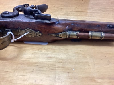 Lot 966 - Early 19th century Flintlock officers pistol with octagonal barrel, side lock, walnut stocked with brass mounts and original ram rod 28cm long overall, the barrel 16cm