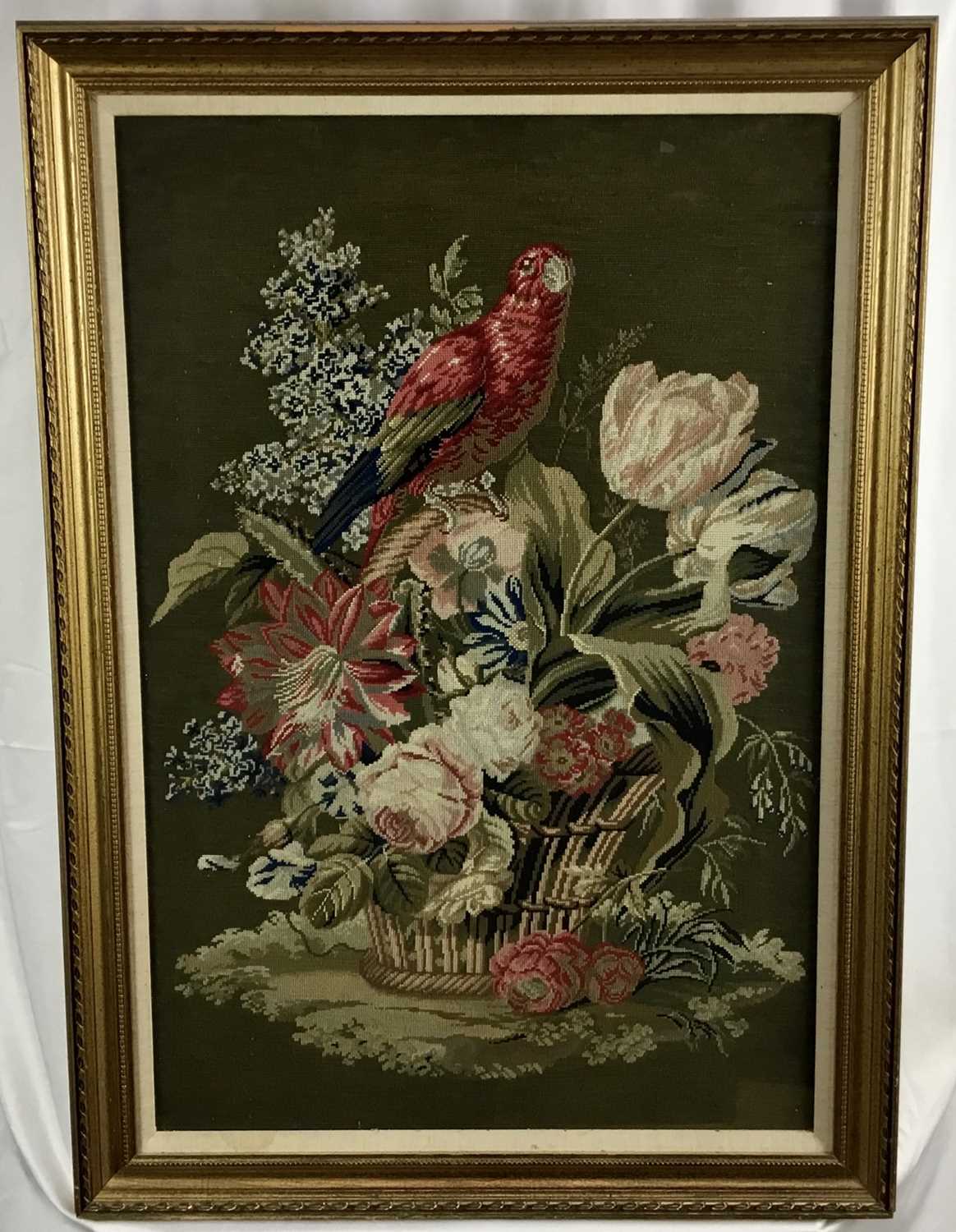 Lot 429 - Victorian-style tapestry panel depicting a parrot among flowers, 76cm x 50cm, in glazed frame, together with tapestry pole screen mounted in a frame, 50cm x 40cm (2)