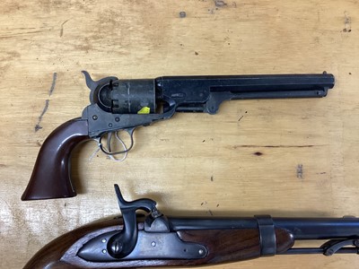Lot 970 - Reproduction Flintlock military pistol, similar percussion military pistol and reproduction revolver (4)