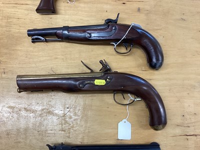 Lot 970 - Reproduction Flintlock military pistol, similar percussion military pistol and reproduction revolver (4)