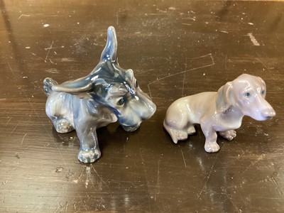 Lot 1272 - Ten Danish models of various dogs, numbered 1133, 1094, 1134, 1895, 1156, 1676, 1008, 1120, 1139, and 1140, most by Dahl Jensen