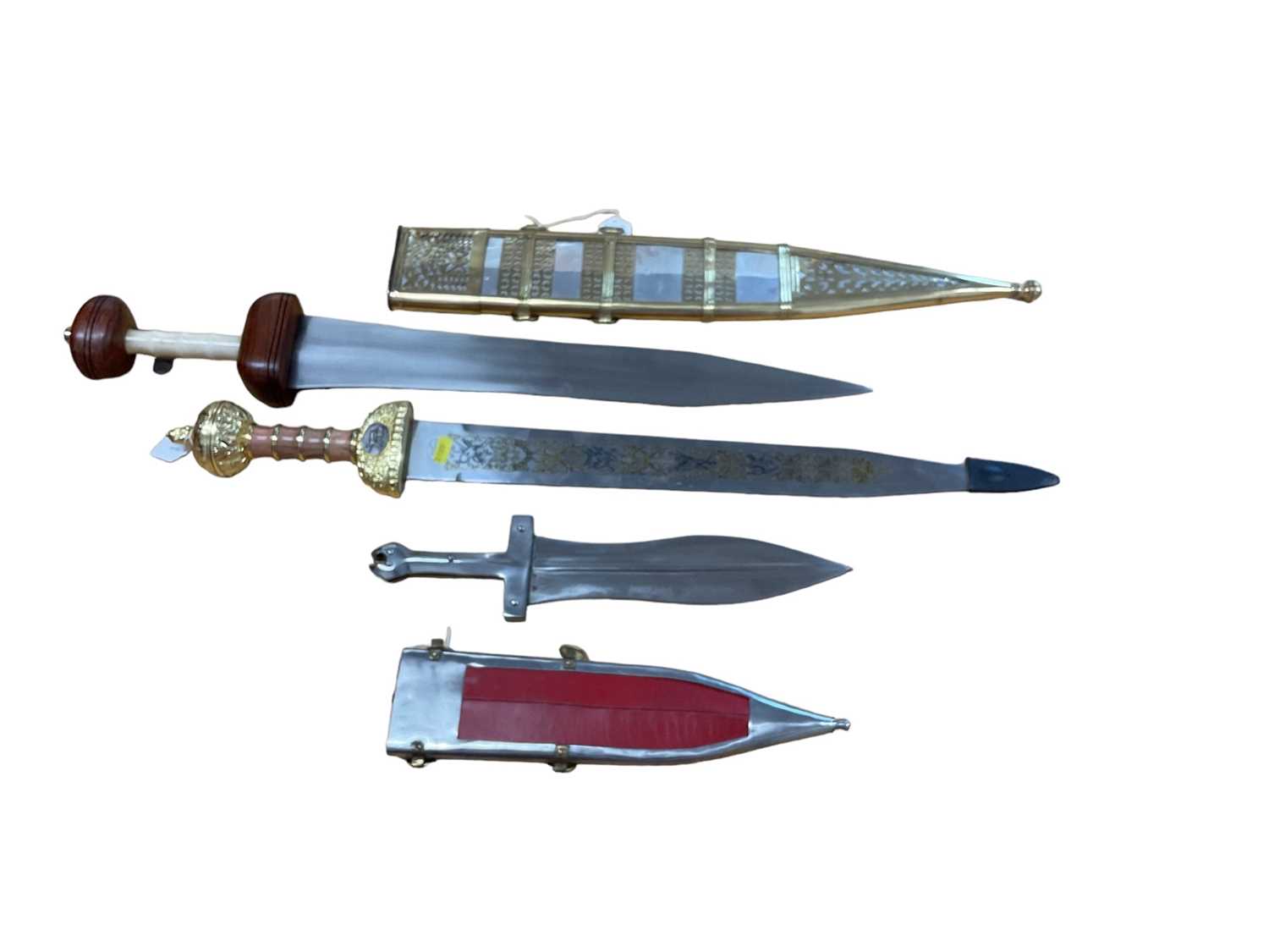 Lot 920 - Three reproduction Roman gladius swords, two with sheaths