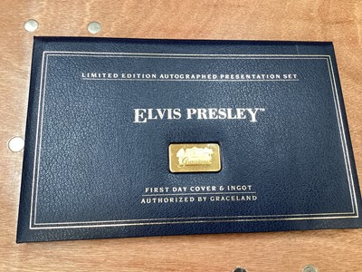 Lot 515 - World - A box containing loose - mixed first day coin/stamp covers with silver issues noted and Elvis Presley with 'Graceland' Ingot, plus an album of stamp covers (Qty)