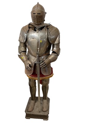 Lot 691 - Reproduction steel suit of armour complete with helm and sword on wooden display stand