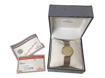 Lot 178 - 1990s Omega De Ville quartz calendar wristwatch with integral bracelet in box with papers