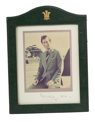 Lot 10 - H.R.H. The Prince of Wales (now H.M. King Charles III) signed 1980 presentation photograph in leather frame