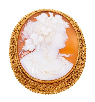 Lot 410 - 19th century Italian carved shell cameo brooch depicting a bacchanalian classical female bust