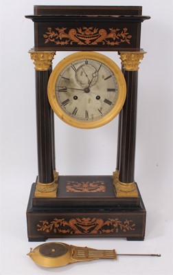 Lot 604 - Early 19th century portico clock of bold size, the large silvered dial with second hand flanked by classical pillars with gilded tops & pendulum