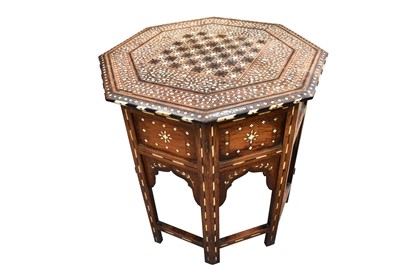 Lot 1223 - Good antique Anglo Indian octagonal ivory inlaid games table, the octagonal top profusely inlaid with a games board and foliate geometric boarders