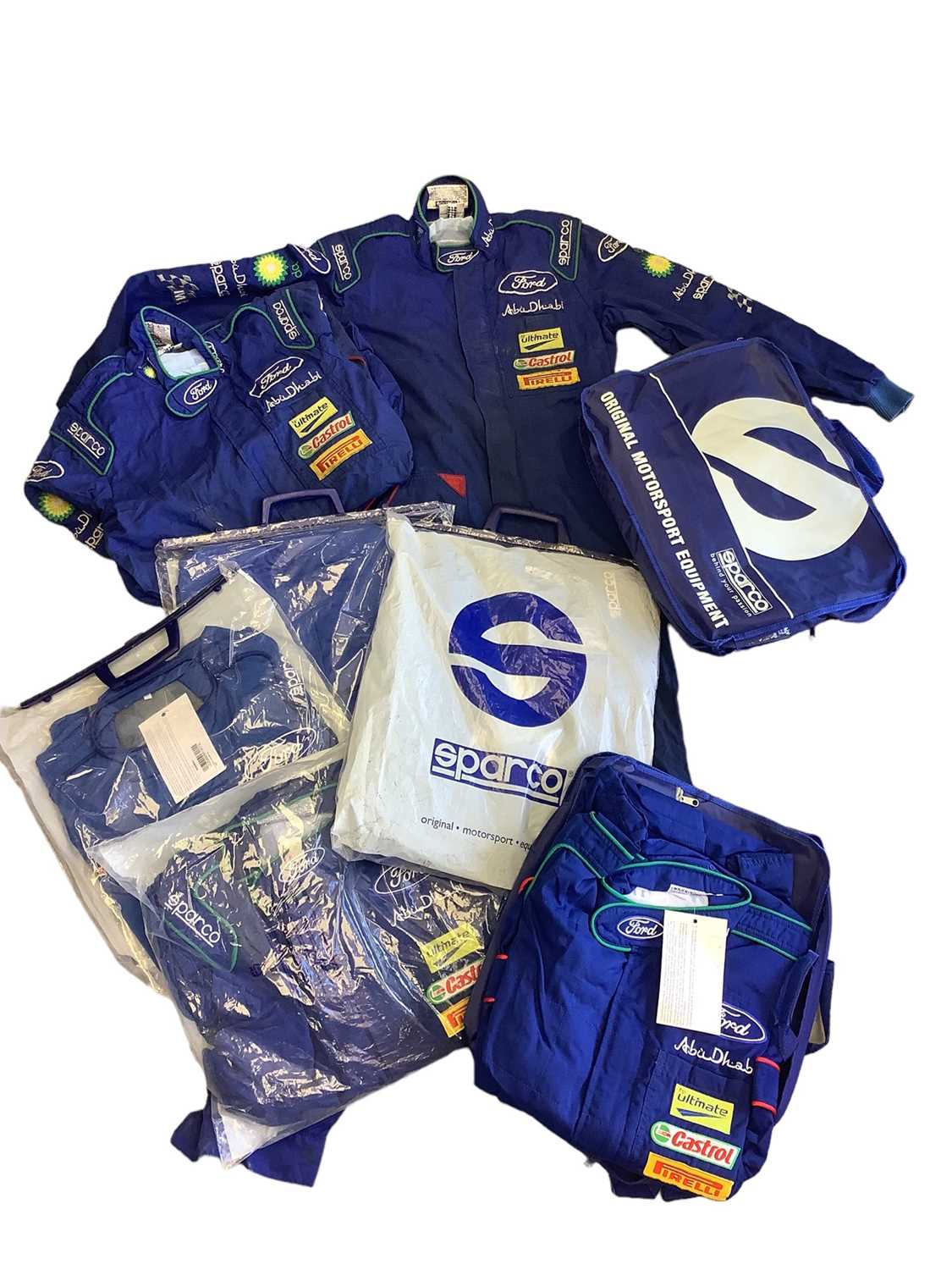 Lot 2027 - Motorsport Interest- Group of early 2011 / 12 Ford World Rally Championship WRC M Sport team sparco mechanics suits, both used and unused (qty)