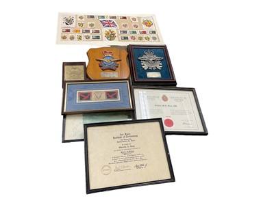 Lot 669 - Group of framed aircraft prints, cloth military badges in frames and other framed documents (qty)