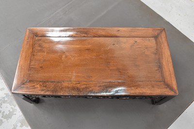 Lot 1144 - 19th century Chinese hardwood low table