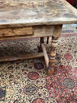 Lot 1180 - French-style chestnut farmhouse table with single drawer, turned legs joined by stretchers, 179cm long x 70cm wide x 77cm high