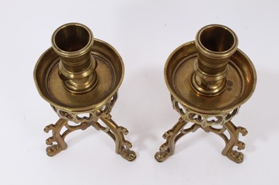 Lot 644 - A pair of Gothic Revival brass candlesticks