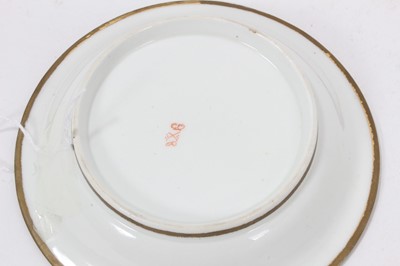 Lot 74 - A Derby saucer, painted with playing cards, circa 1815