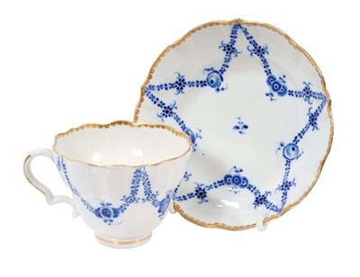 Lot 75 - A Caughley ogee shaped tea cup and saucer, painted with the Rose Festoon Pattern, circa 1785