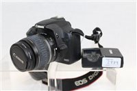 Lot 2879 - Canon EOS 500D Camerasera body, together with...