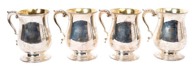 Lot 236 - Set of four silver baluster mugs