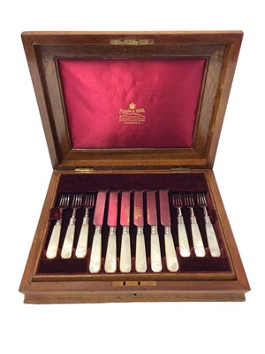 Lot 238 - Late Victorian cased set of 12 pairs of silver bladed fruit knives and forks