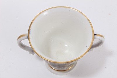 Lot 79 - A Derby blue ground two handled cup, circa 1820
