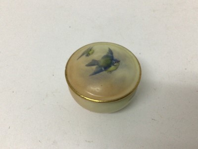 Lot 25 - A Royal Worcester small round pot and cover