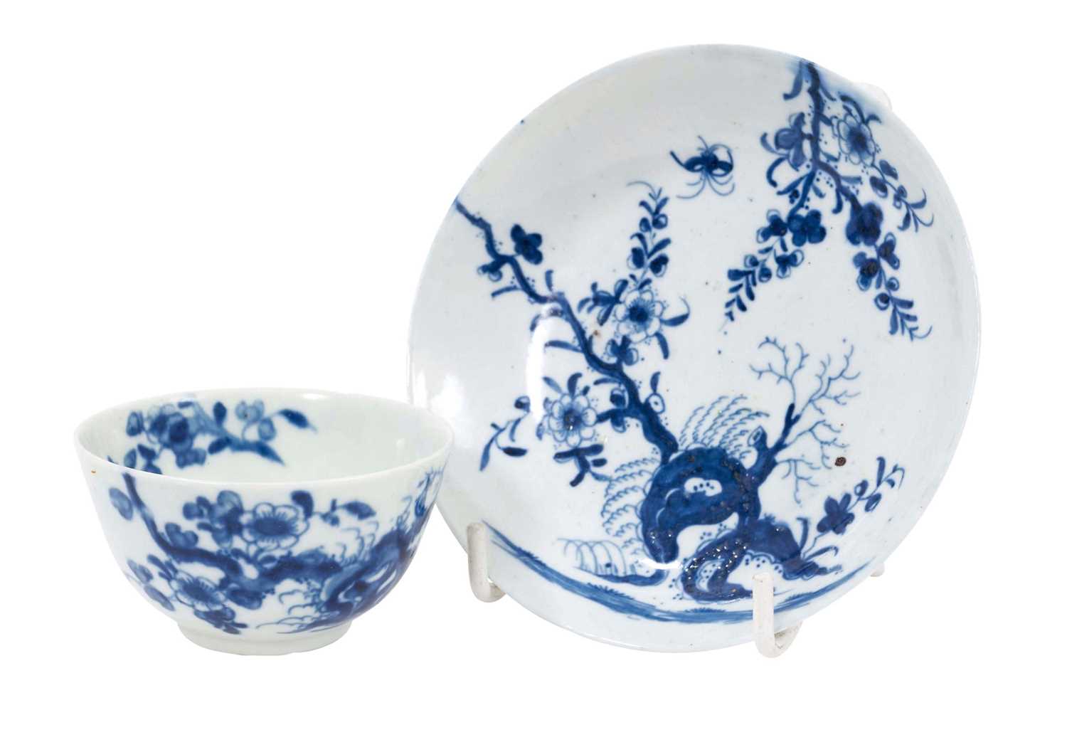 Lot 90 - A Worcester Prunus Root tea bowl and saucer, circa 1756-58