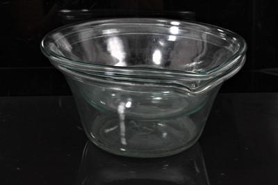 Lot 10 - A pair of Rare Georgian glass pouring bowls possibly for cream separation with heavy folded rims and broken pontils.