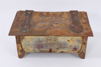 Lot 651 - An Arts and Crafts copper box, with exposed construction and embossed ornament of stylised snails and foliage, 26cm wide