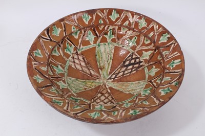 Lot 50 - An early antique earthenware or red ware pottery bowl with glazed decoration.