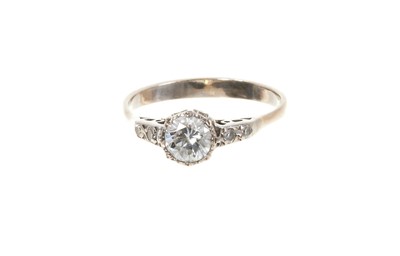 Lot 493 - Diamond single stone ring with a round brilliant cut diamond estimated to weigh approximately 0.50cts, with diamond set shoulders on 18ct white gold shank.