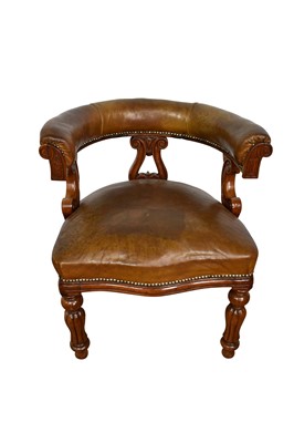 Lot 1051 - Victorian walnut and button closed mahogany tub chair, with lyre shape splat, raised on fluted baluster legs