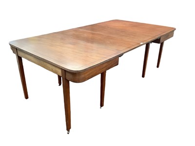 Lot 1200 - Regency mahogany D-end extending dining table, ebony line inlaid top with reeded edge, raised on square tapered legs and castors, with two additional leaves, total size 120 x 197cm