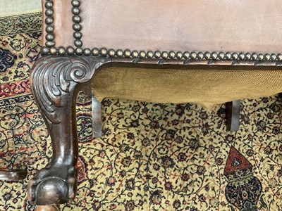 Lot 1107 - Pair of early 20th century leather upholstered club chairs, raised on carved cabriole legs and claw and ball feet