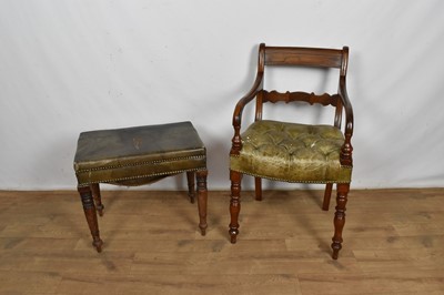 Lot 1112 - Regency elm open armchair with green leather upholstery, together with a leather upholstered stool. (2)