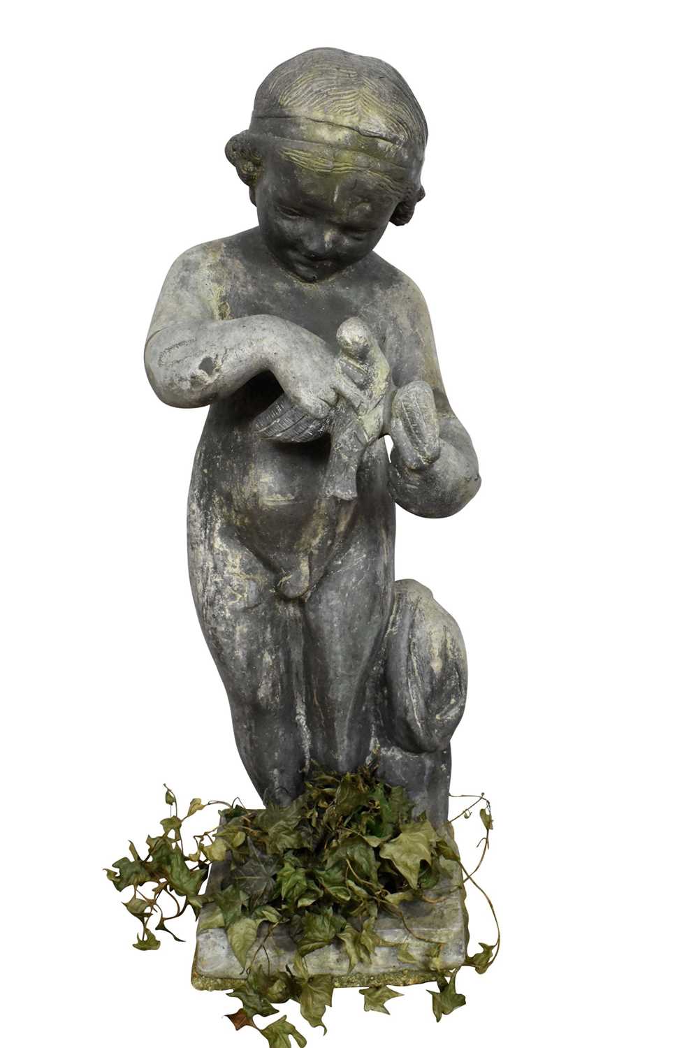 Lot 1114 - Antique lead garden sculpture, in the form of a putto with dove, on square integral plinth, 74cm high