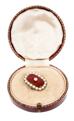 Lot 438 - Regency gold enamel and pearl brooch with a central half pearl on red guilloché enamel ground surrounded by a border of eighteen half pearls