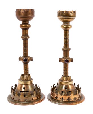 Lot 645 - A pair of candlesticks by G Betjemann and sons, Registered Mark for 14th March 1865. Lacking some paste gems