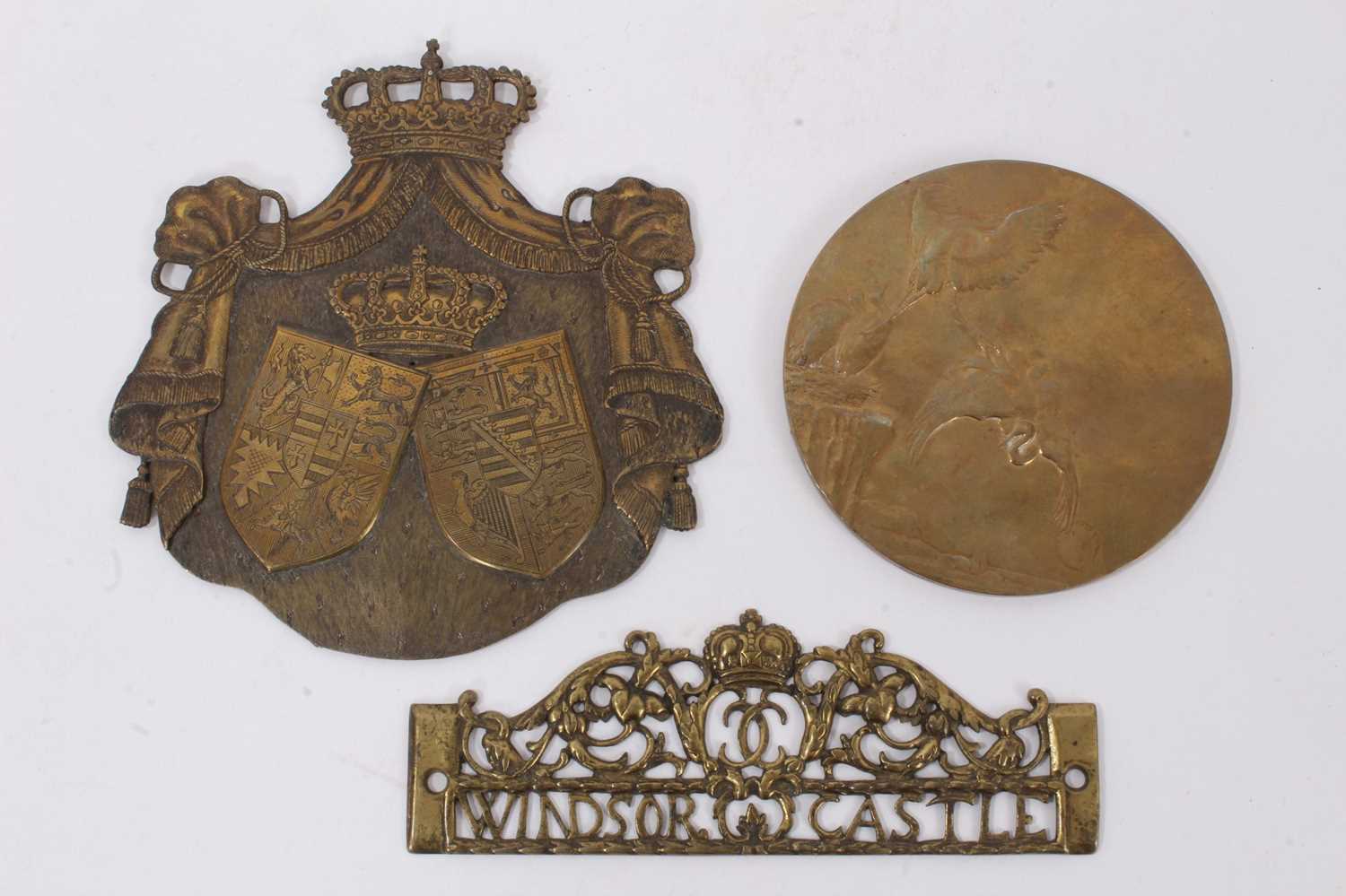 Lot 667 - Brass Coat of Arms for Queen Victoria’s daughter and husband, plus a brass plaque bearing legend “Windsor Castle”. With a French bronze aviation medal dated 1920, bearing legend “Feriam Sidera” (“R...