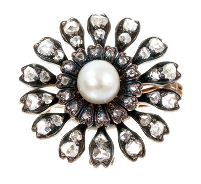 Lot 484 - Victorian diamond and pearl flower head brooch, with a central pearl measuring 7.1-7.4mm surrounded by rose cut diamond petals in silver and gold setting, 29mm.