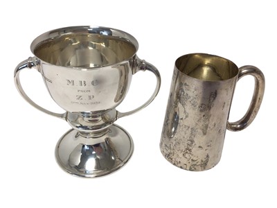 Lot 219 - 1930s silver two handled cup with flared rim and a silver glass bottom tankard