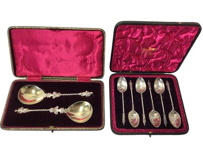 Lot 223 - Set of six Victorian silver Apostle spoons with chased foliate decorated bowls in original case .